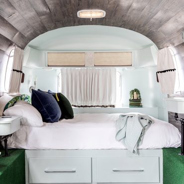 Airstream camper bed at Sandy Pines Campground